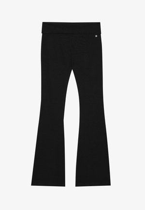 Fekete, bővülő leggings puha anyagból, széles elasztikus derékkal és egy kis logóval a derékrészen.