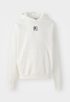Weißer Kapuzenpulli aus weichem Material. Verfügt über eine zentrale Fronttasche und ein graues Logopatch auf der Brust. Lockere Passform mit gerippten Bündchen.