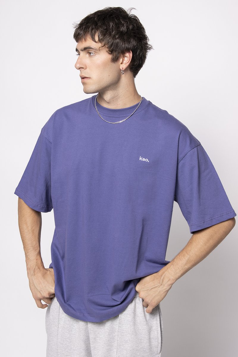 Purple cotton t-shirt with short sleeves, relaxed fit, featuring a small white "kao." logo on the left chest. Smooth texture.