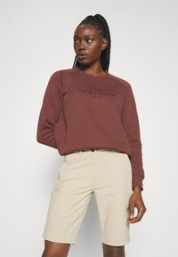 Mammut RUNBOLD ZIP OFF PANTS WOMEN - Hlače za na prostem - savannah