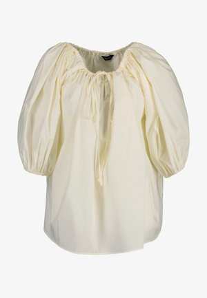 Lys gul bluse med løs pasform, puffede ærmer, elastiske manchetter og en sammet halsudskæring med justerbar snor. Blødt bomuldsstof.