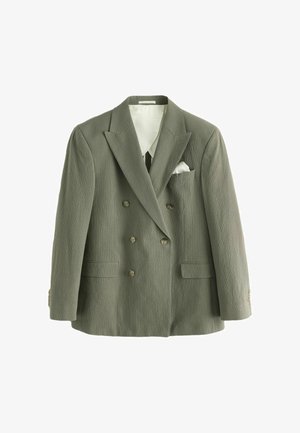Double-breasted olive green blazer with textured fabric, notch lapels, white inner lining, and white pocket square in left chest pocket.