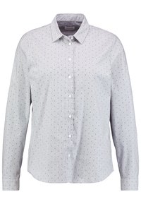 Camicia bianca con bottoni e maniche lunghe, caratterizzata da sottili strisce blu e nere e piccoli pois neri su tutta la superficie. Finitura in tessuto strutturato.