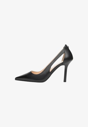 Décolleté in pelle nera con tacco alto, punta a punta, tacco sottile e lati aperti, mostrata dal lato esterno.