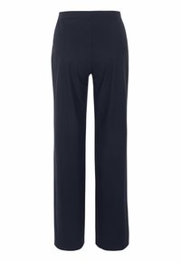 Marinefarbene weite Hose mit Gummibund, aus weichem Stoff gefertigt. Verfügt über eine glatte Textur und keine sichtbaren Nähte oder Taschen.