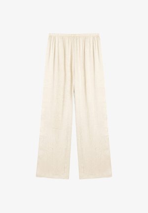 Pantaloni color crema a gamba larga con vita elasticizzata e delicato motivo floreale impresso, stesi su sfondo bianco.