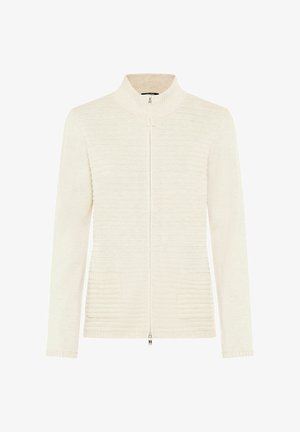 Lichtcrème cardigan met een hoge kraag, full front rits, een gestructureerd breisel ontwerp en twee voorzakken. Lange mouwen met geribbelde manchetten.