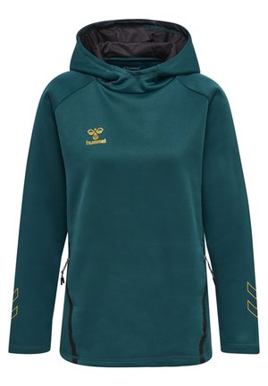 Türkise Kapuze mit einer Fronttasche, einer schwarz gefütterten Kapuze und goldenen Logo-Details. Verfügt über lange Ärmel mit seitlichen Reißverschlussöffnungen.