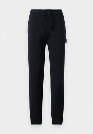 Black sweatpants with an elastic waistband, adjustable drawstring, and a side tag. Made from a soft, comfortable material with a smooth texture.