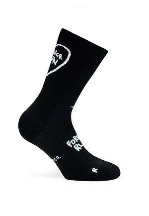 Calcetines negros de mezcla de algodón con diseños de texto en blanco, incluyendo una forma de corazón y frases, con una textura suave.