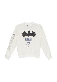 Biała bluza z kapturem z czarnym logo Batmana i napisem, z kontrastującą czarną grafiką na lewym rękawie, z ściągaczami na rękawach i w dolnej części.