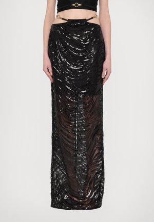 Black sequined skirt with a wavy texture, floor-length, sheer sections, and a decorative waistband featuring gold accents.