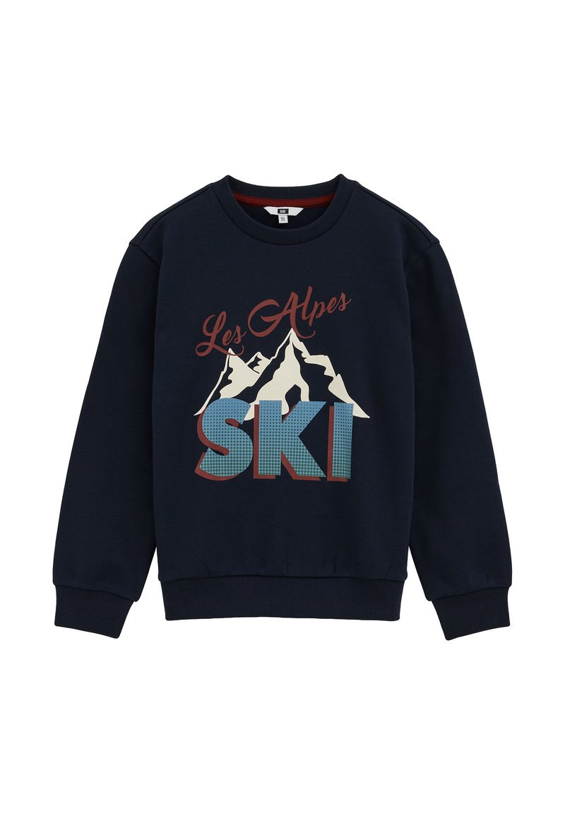 Jūras spēku džemperis ar uzrakstu "Les Alpes" un kalnu grafikām, "SKI" zilā un sarkanā krāsā, ribotām piedurknēm un apaļu kakla izgriezumu. Mīksta kokvilnas auduma.