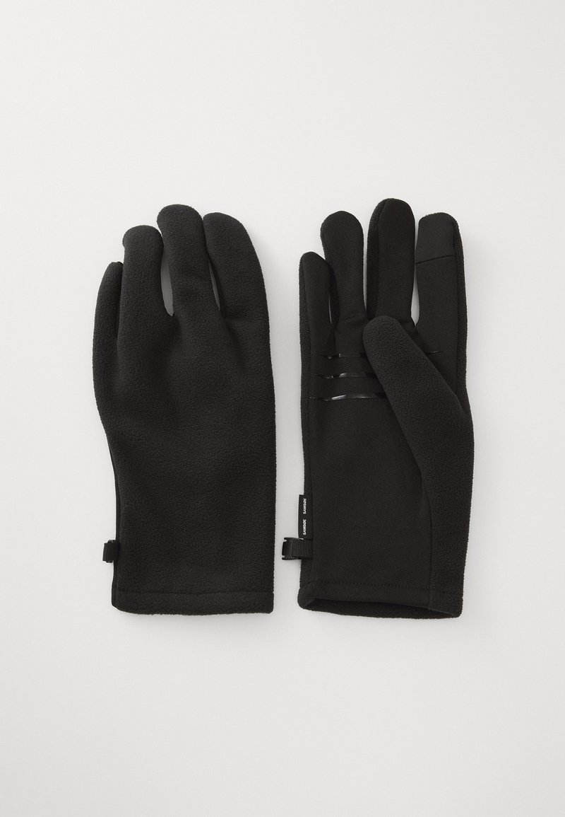 Black gloves made of fleece material feature a textured surface, curved finger design, and elastic accents for a snug fit.