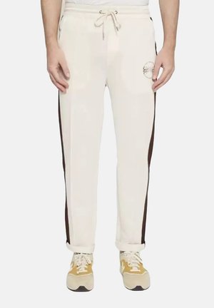 LOGO - Pantaloni sportivi - beige