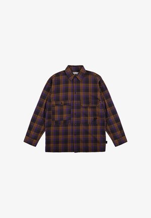 Brązowa i fioletowa koszula w kratę z długim rękawem, z dwoma przednimi kieszeniami i unikalnym czarnym haftem. Miękka faktura materiału.