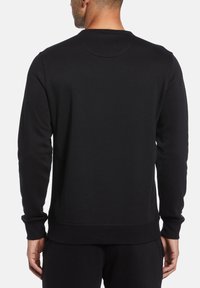 Zwarte sweatshirt met een ronde hals, geribbelde manchetten en zoom. Gladde textuur, iets relaxte pasvorm, minimalistisch ontwerp, geen zichtbare patronen of logo's.