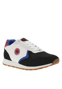 Baskets noires, blanches et bleues avec une tige en maille, une semelle en caoutchouc et un patch logo. Dispose d'un col rembourré et d'une zone de lacets texturée.