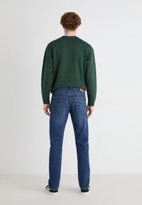 Levi's® 502™ TAPER - Džínsy tapered fit - records on