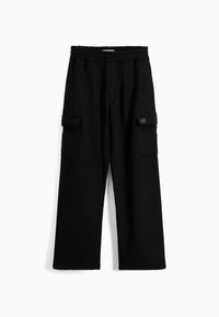 Svarta träningsbyxor med elastisk midja, vida ben, två sidofickor, cargo-fickor och en liten logotyp.