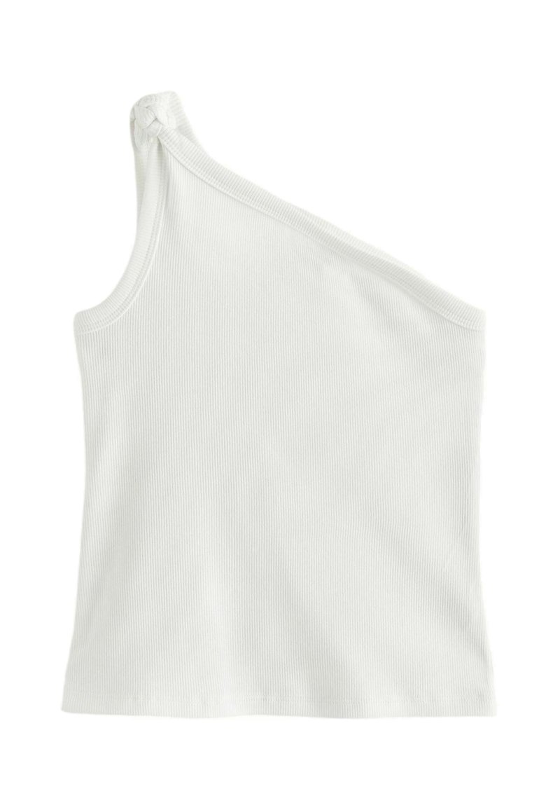 Débardeur blanc à côtes avec un design asymétrique à une épaule, présentant un détail de nœud à l'épaule et une silhouette ajustée.