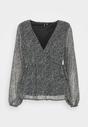 Schwarze, durchsichtige Bluse mit langen Ärmeln und unregelmäßigem weißen Punkte-Muster, V-Ausschnitt mit Wickel-Front sowie gerafften Ärmeln und Taille.