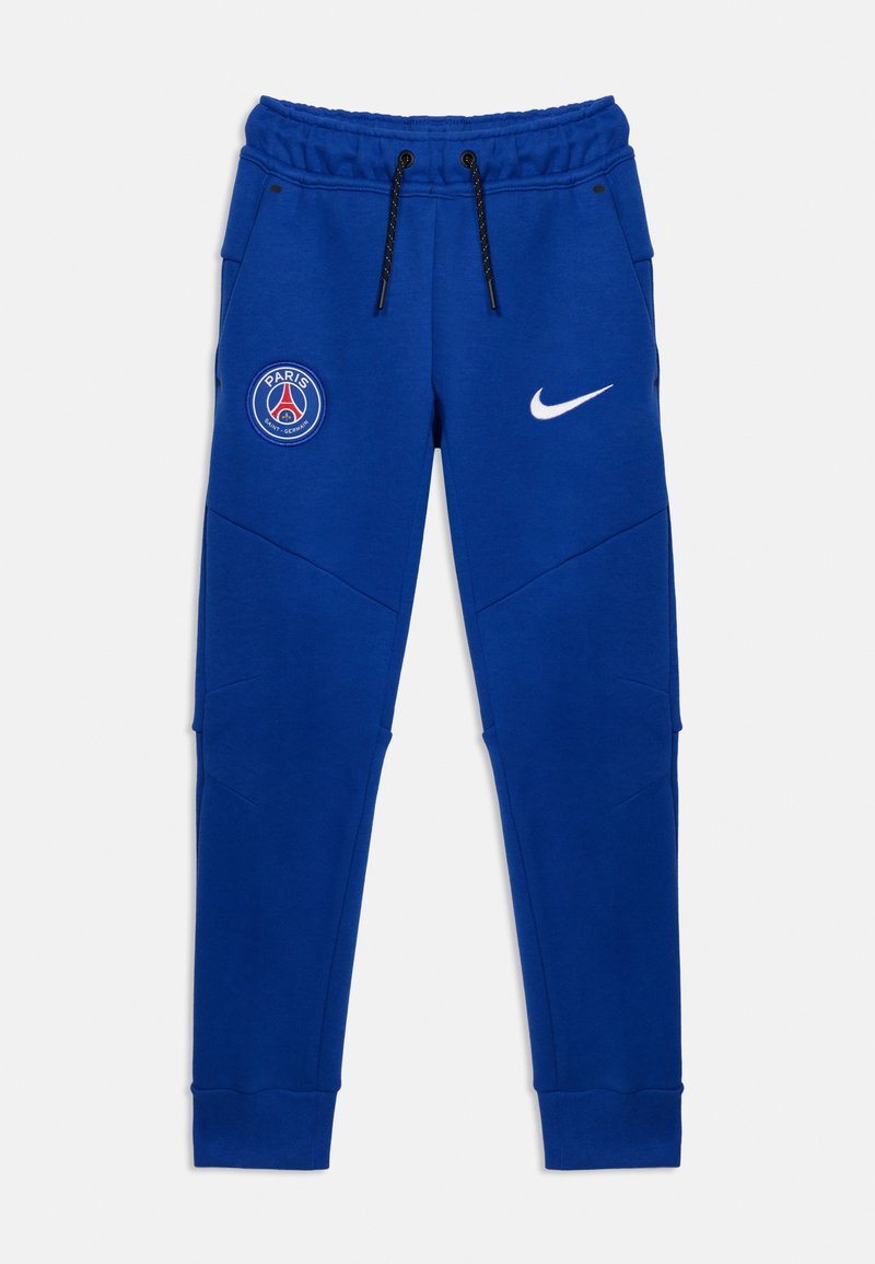 Μπλε φόρμα Nike με ελαστική μέση, μαύρα κορδόνια, λογότυπο Paris Saint-Germain στο αριστερό μηρό και λευκό σύμβολο Nike στο δεξί μηρό.