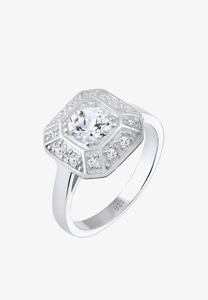 Sterling Silberring mit achteckigem Design, featuring einem großen zentralen klaren Edelstein, umgeben von kleineren Steinen, polierte Oberfläche.