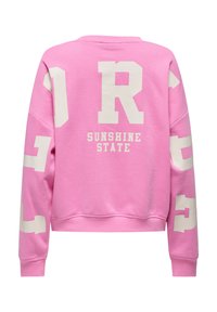 Sweat-shirt rose avec de grandes lettres blanches en bloc dans le dos et sur les manches, avec le texte "SUNSHINE STATE" centré sous un grand "R".