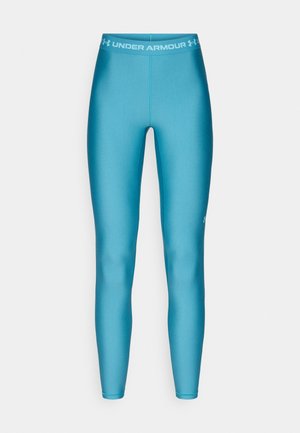 Turkise træningsleggings lavet af glat, elastisk materiale. Har en elastisk talje med "Under Armour"-logo i hvid.