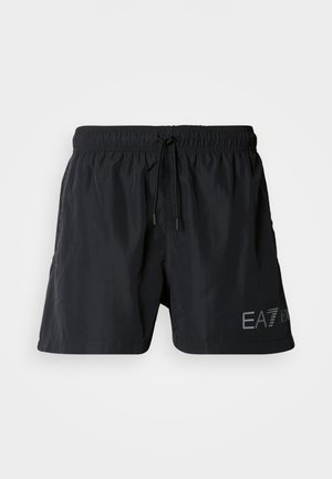 Costume da bagno nero in materiale leggero, dotato di vita elastica con coulisse e logo stampato sul lato inferiore sinistro.