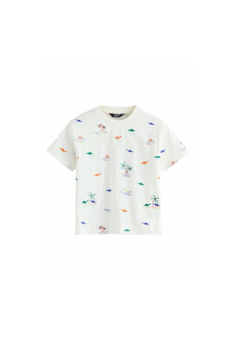T-shirt en coton blanc avec des motifs brodés colorés de dinosaures, d'arbres et de vagues. Encolure ronde et manches courtes. Coupe décontractée.