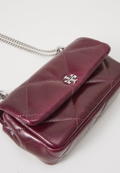 Burgundy leather crossbody bag with quilted design, silver hardware, and adjustable chain strap. Compact rectangular shape.