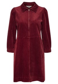 Robe en velours côtelé bordeaux avec un col, fermeture éclair à l'avant, manches longues bouffantes et poignets froncés, présentant une texture à côtes verticales.
