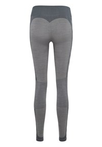 Graue Leggings mit einem hohen Bund, strukturierten Mustern und einem einzigartigen Herzdesign auf der Rückseite, aus dehnbarem Stoff gefertigt.