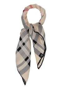 Silkkihuivi, jossa on beige pohja ja musta-valkoinen ruutukuvio. Reunat on viimeistelty mustalla, ja ylhäältä löytyy punaisia yksityiskohtia.