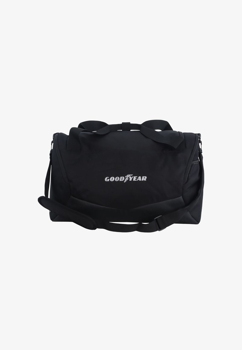 Black duffel bag made of durable fabric, featuring two handles and an adjustable shoulder strap. Displays "GOODYEAR" logo in white.