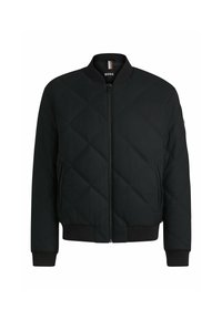 Black quilted bomber jacket with ribbed cuffs and hem, featuring a front zipper and a tag on the neck with the brand logo.