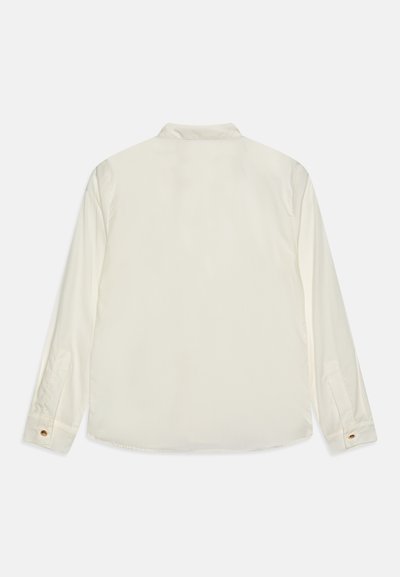 Camicia a maniche lunghe in tessuto bianco sporco, con colletto classico, polsini con bottone e una texture liscia. Nessun motivo o accento visibile.