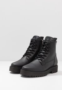 Nubikk Botines con cordones - black