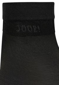 Chaussette noire pour la cheville avec une texture lisse et un bord supérieur côtelé arborant le mot "100%" subtilement tissé.