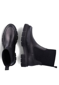 Melnas ādas potītes zābaki ar elastīgām detaļām, gumijas zoles un rakstu apdari. Iekļauj apaļu purngalu un izturīgu konstrukciju.