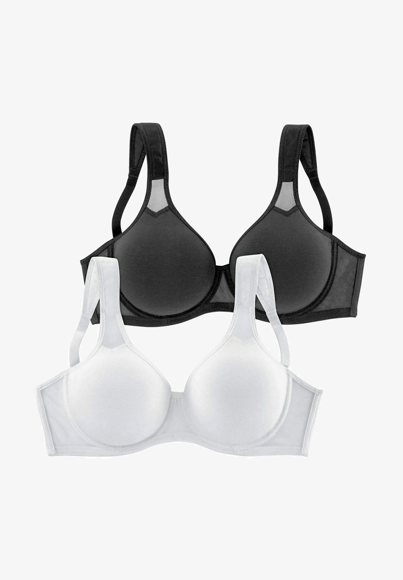 Schwarz-weiße BHs mit glatten, geformten Cups, verstellbaren Trägern und nahtlosem Design. Weicher Stoff mit kontrastierenden Nähten.