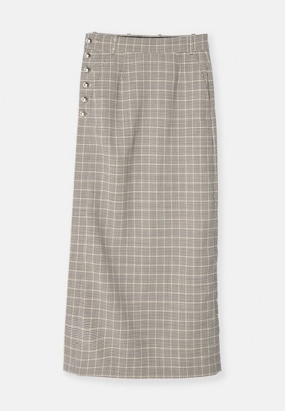Fustă lungă, cu model în grilă, alb-negru. Prezintă o croială dreaptă, talie înaltă și butoane decorative pe laterale. Realizată dintr-un material țesut.