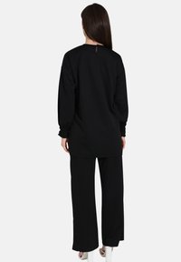 Modanisa SET - Bukser - black