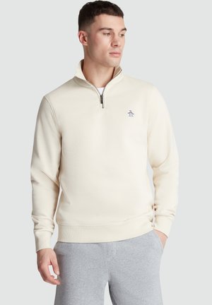 Cremefarbener Sweatshirt mit Viertelreißverschluss, gerippten Bündchen und einem Pinguin-Logo auf der Brust. Hergestellt aus weichem, strukturiertem Stoff.