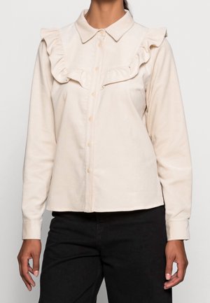 Blusa - beige
