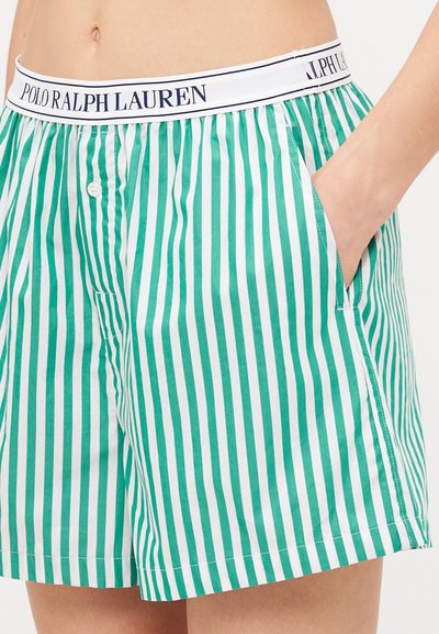 Zaļi un baltā svītrainie šorti ar pogu aizdari, sānu kabatām un zīmola jostu ar uzrakstu "POLO RALPH LAUREN" tumši zili.