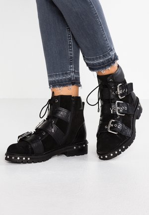 Botines camperos - black