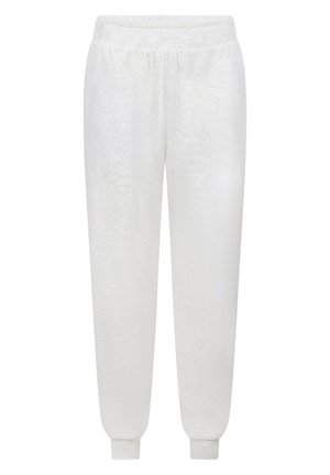 White fleece joggers with an elastic waistband and cuffs, featuring a soft texture and a relaxed fit for comfort. Smooth finish, no patterns.